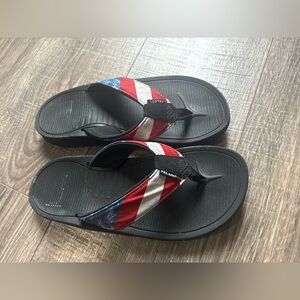 Pelagic Men's flip flops with Black, Red, and Blue Stripes
